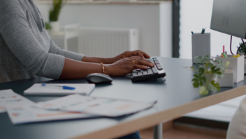 48589553 Close Up Of Teenager With Dark Skin Hands On Keyboard
