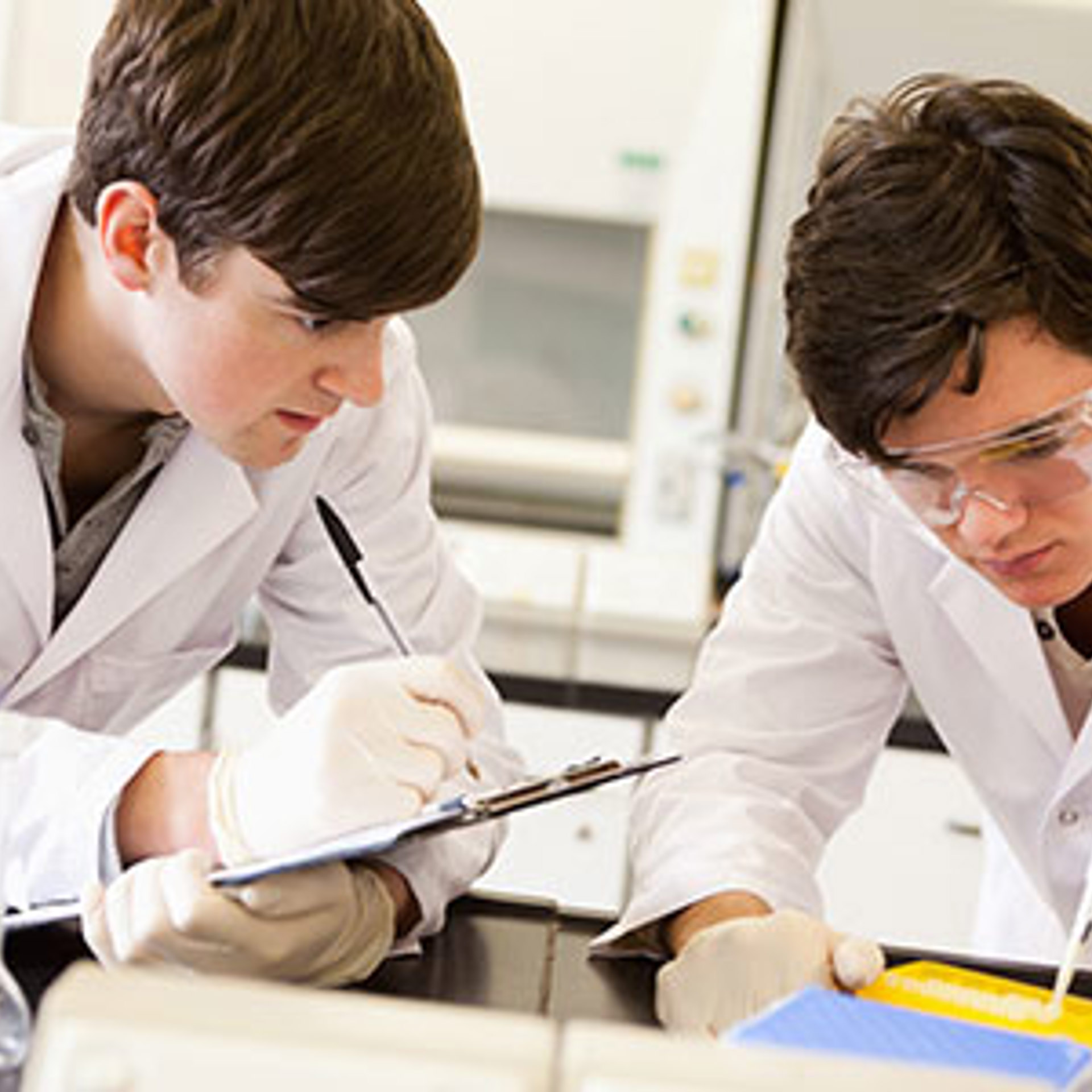 3649699 Male Scientists Making An Experiment