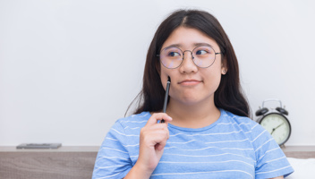 52857673 Asian Girl Teen Thinking Consider About Work Plus Size