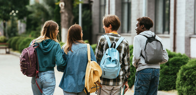 42823854 Back View Of Multiethnic Teenagers With Backpacks